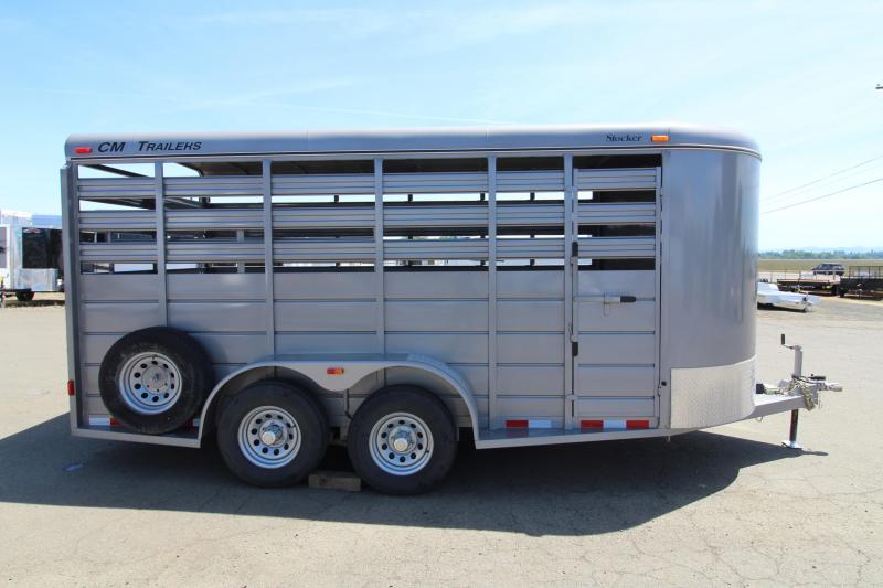 2016 CM Stocker 16 ' Steel Livestock Trailer - With Center Gate - Spare Tire 2016 CM Stocker 16 ' Steel Livestock Trailer - With Center Gate - Spare Tire